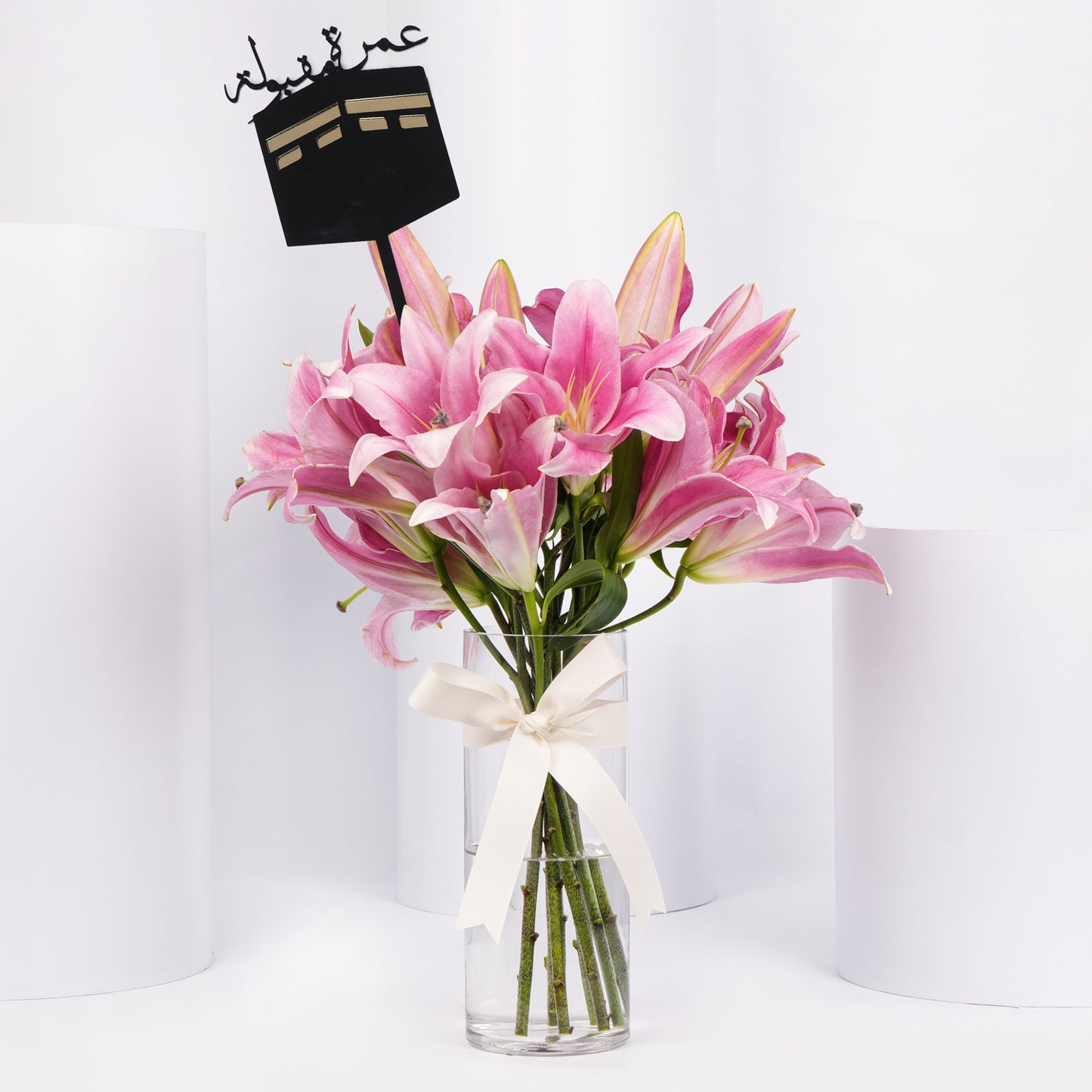 Elegant Blushing Pink Lilies Arrangement with Decorative Topper