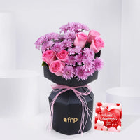 تنسيق فاخر من الورود والديزي