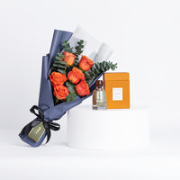 عطر كينوز ديسيرت روز 100 مل مع باقة زهور أنيقة