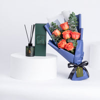 باقة ورود برتقالية فاخرة مع معطر أوبال