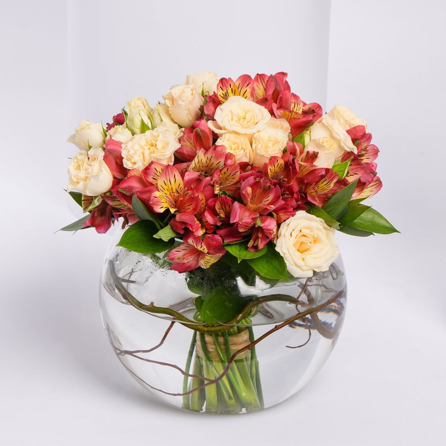 Elegant Peach and Alstroemeria Rose Vase Arrangement in Glass Fish Bowl