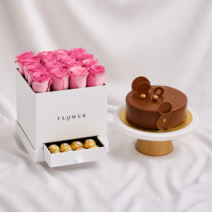 باقة من الورود الوردية والشوكولاتة الفاخرة مع كعكة الفادج
