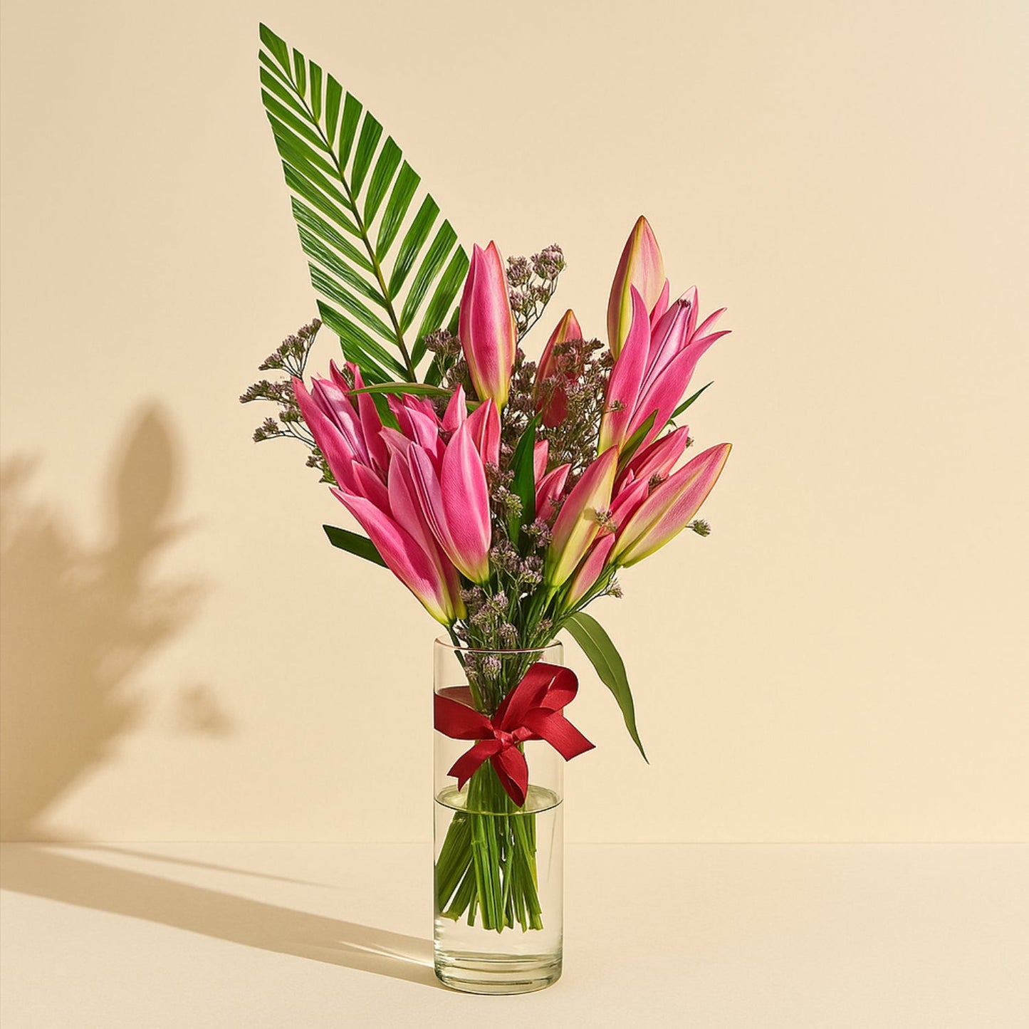Elegant Grand Pink Petals Arrangement in Glass Vase