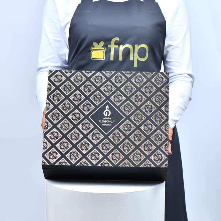 مجموعة هدايا ديفاين: ورود حمراء فاخرة ومجموعة عطور الغوالي