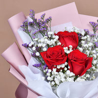 باقة وردة حمراء أنيقة ومبهجة