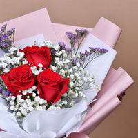 باقة وردة حمراء أنيقة ومبهجة