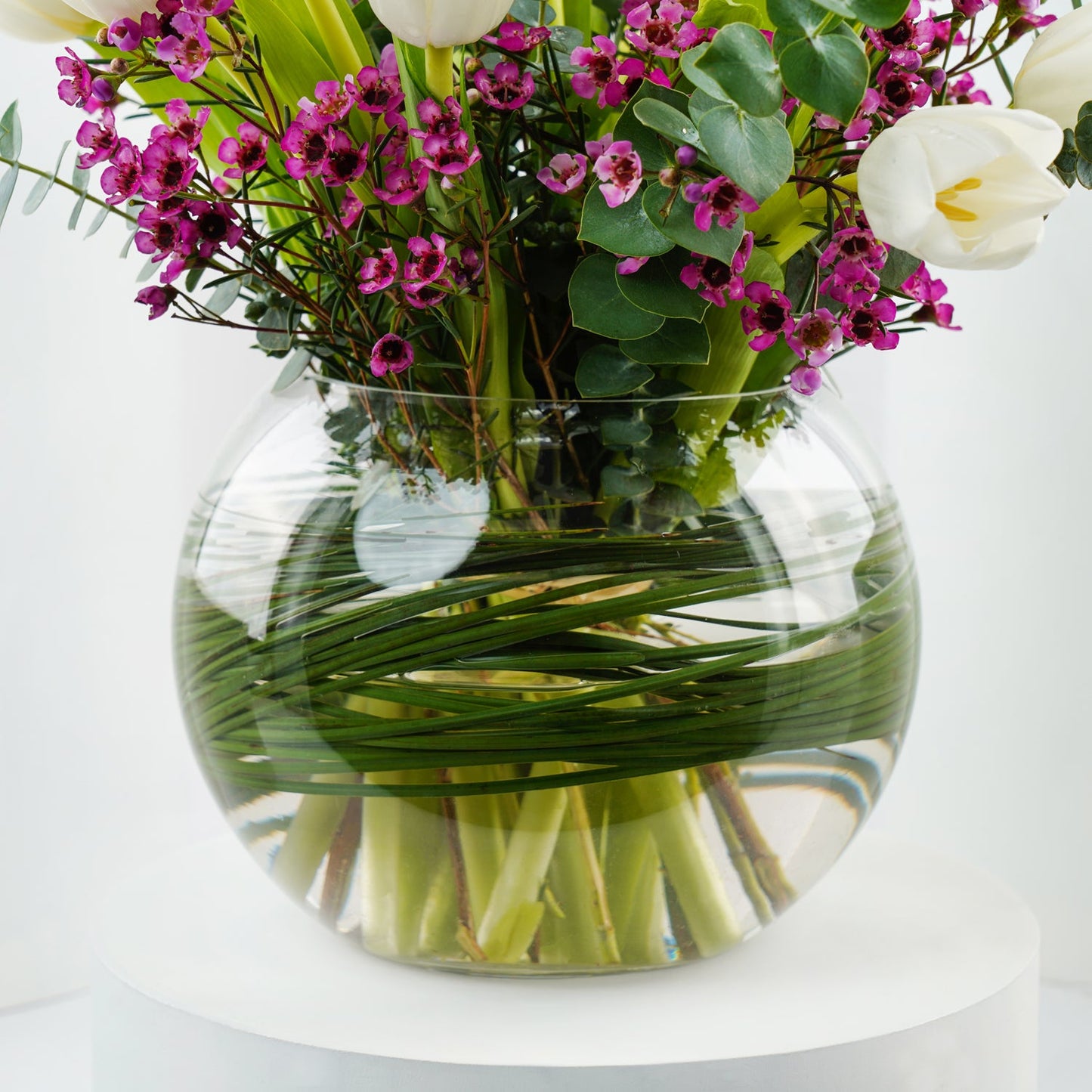 Elegant White Tulip and Wax Flower Arrangement in Glass Vase