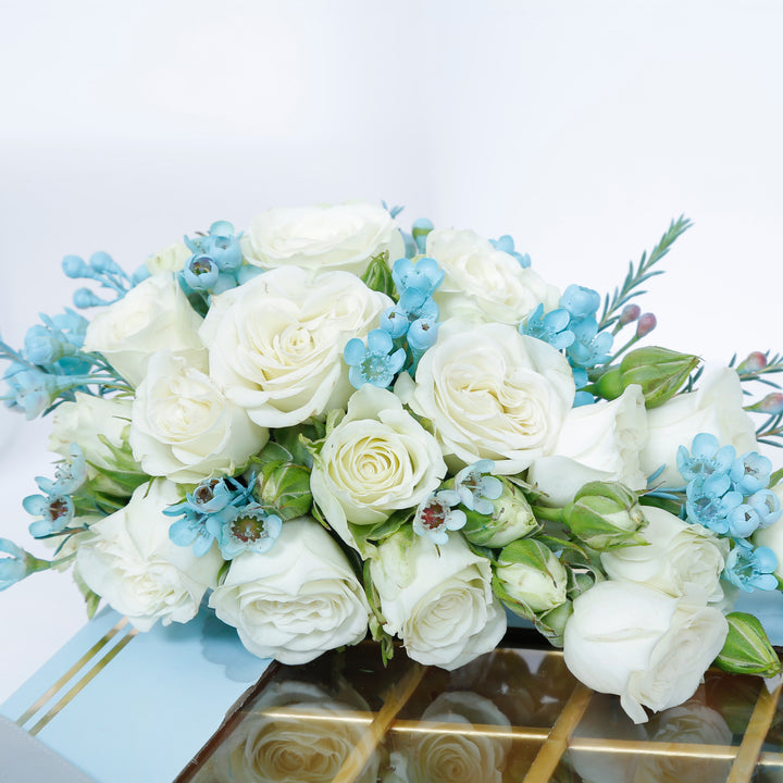 Empire Chocolate: Luxurious Baby Blue Gift Box with 35 Assorted Chocolates & Elegant White Rose Bouquet
