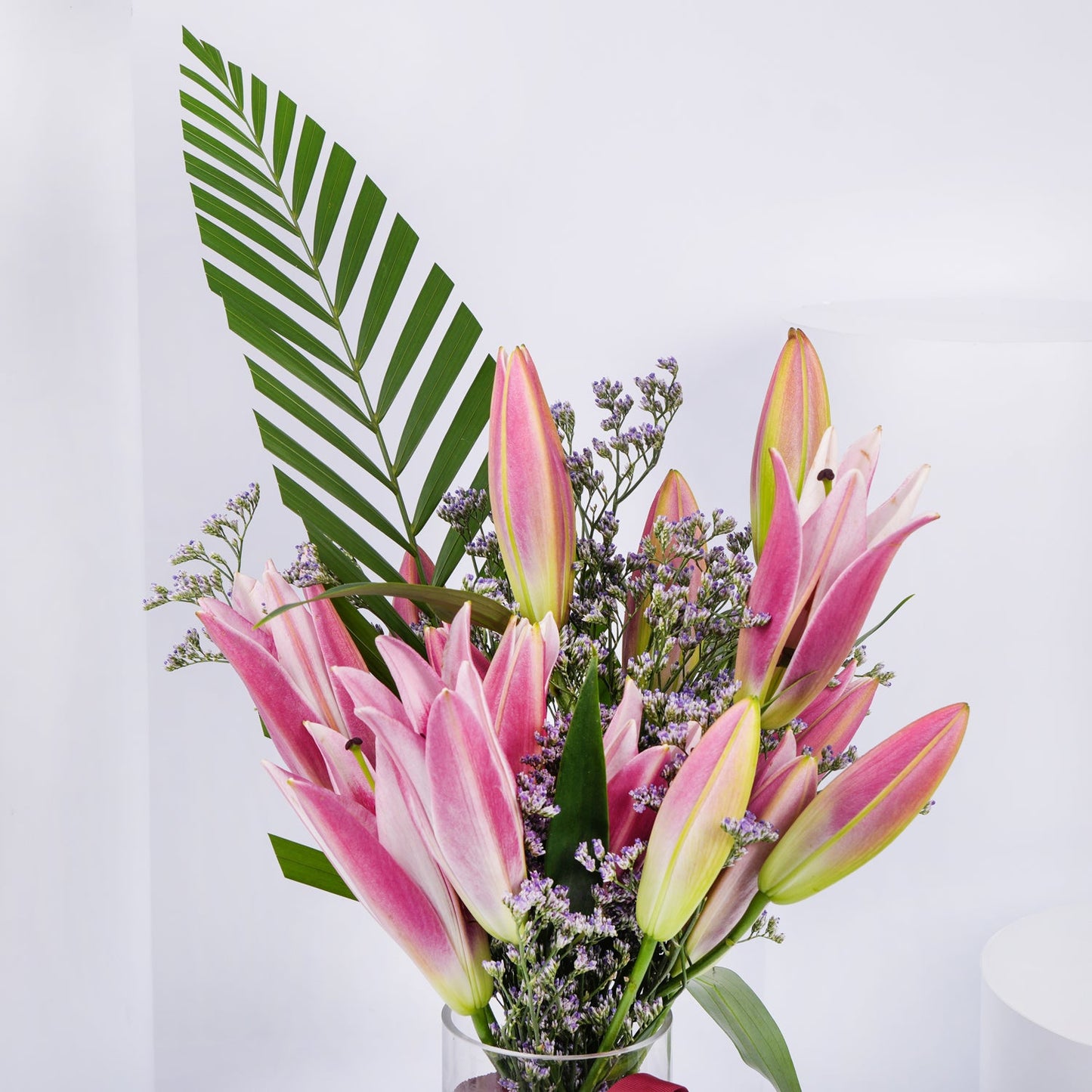 Elegant Grand Pink Petals Arrangement in Glass Vase