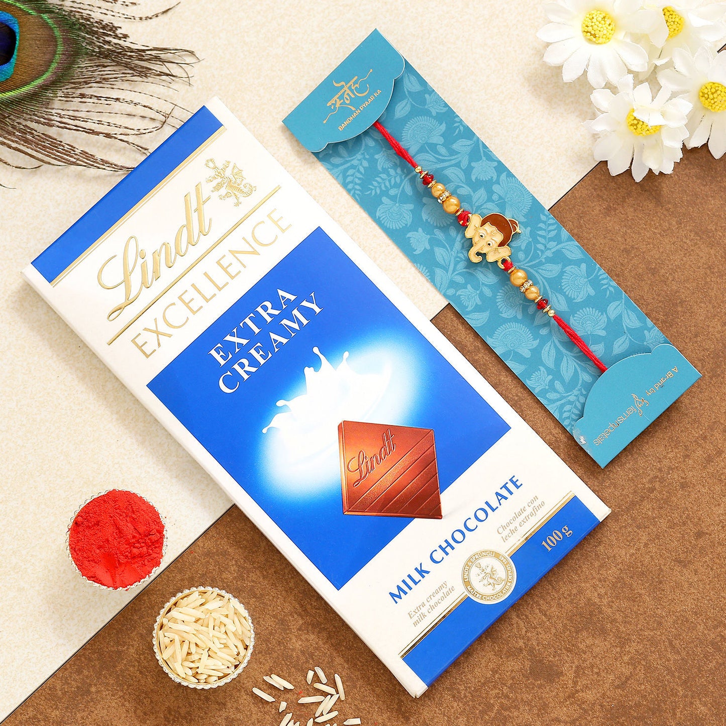 Delightful Bal Ganesha Kids Rakhi with Lindt Extra Creamy Chocolate Bar