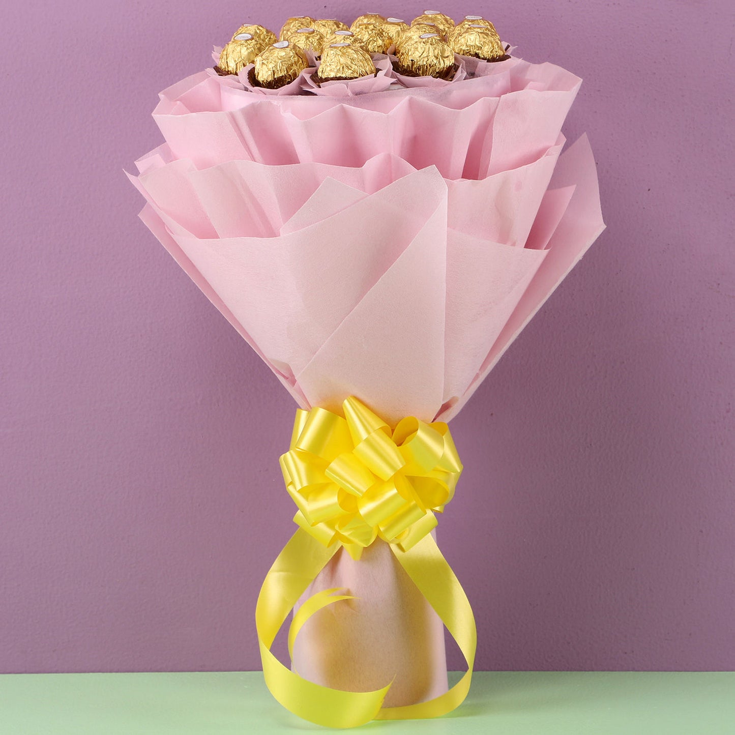 Exquisite Ferrero Rocher Chocolate Bouquet with Pink Wrap and Golden Ribbon