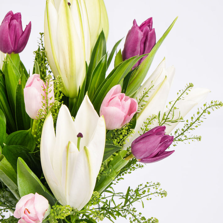 Elegant Medley of Lilies and Tulips in Glass Vase