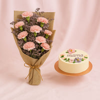 باقة زهور القرنفل الوردي وكعكة الشوكولاتة لأمي