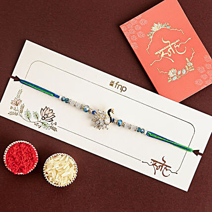 Mystic Harmony Peacock Rakhi with Complimentary Roli and Chawal
