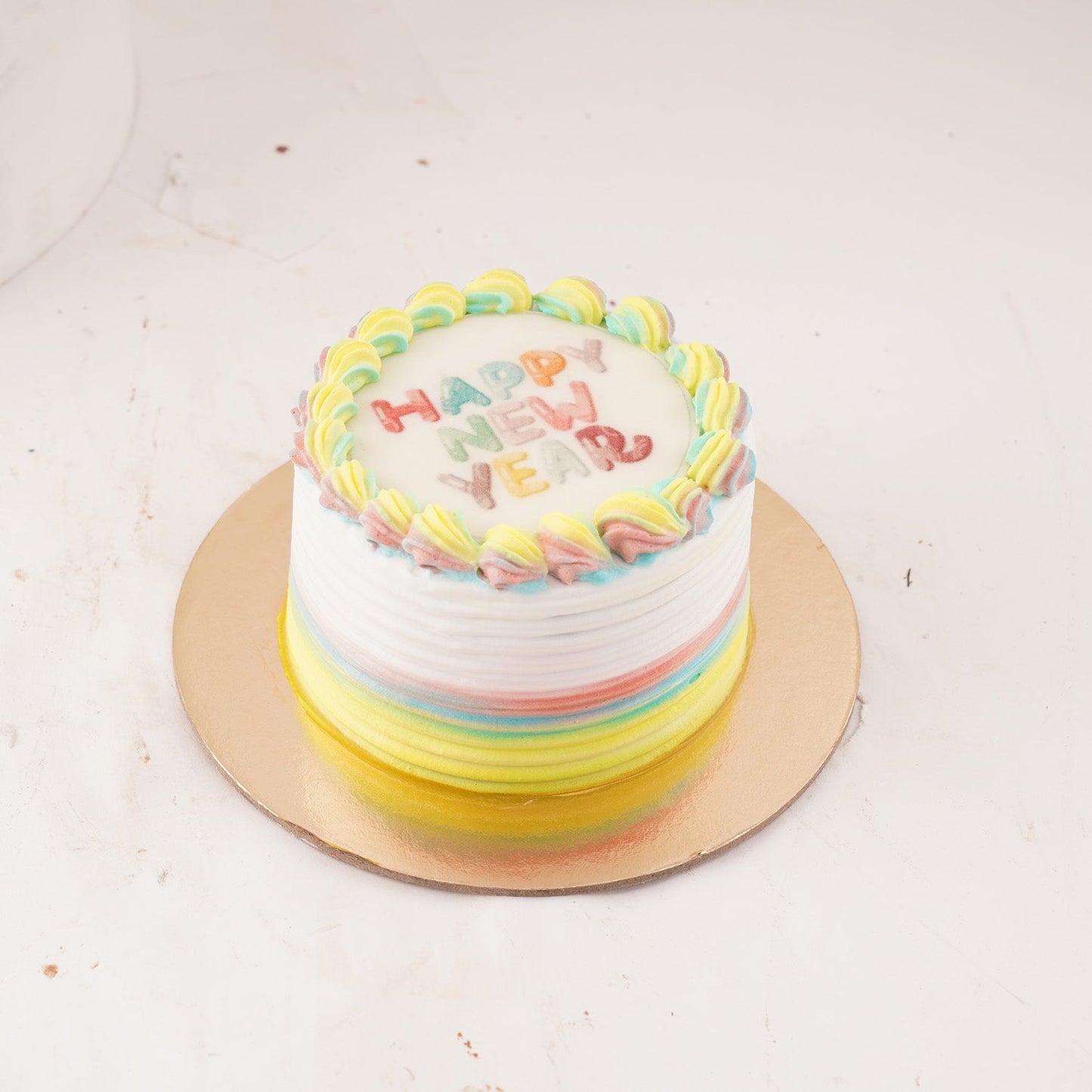 Festive New Year Rainbow Cake Delight