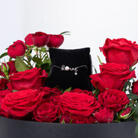 Radiance of Romance: Exquisite Rose Bouquet with Elegant Silver Love Necklace