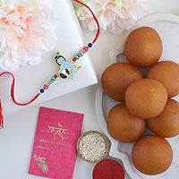 Sneh Bal Krishna Rakhi for Kids with Gulab Jamun and Roli Chawal