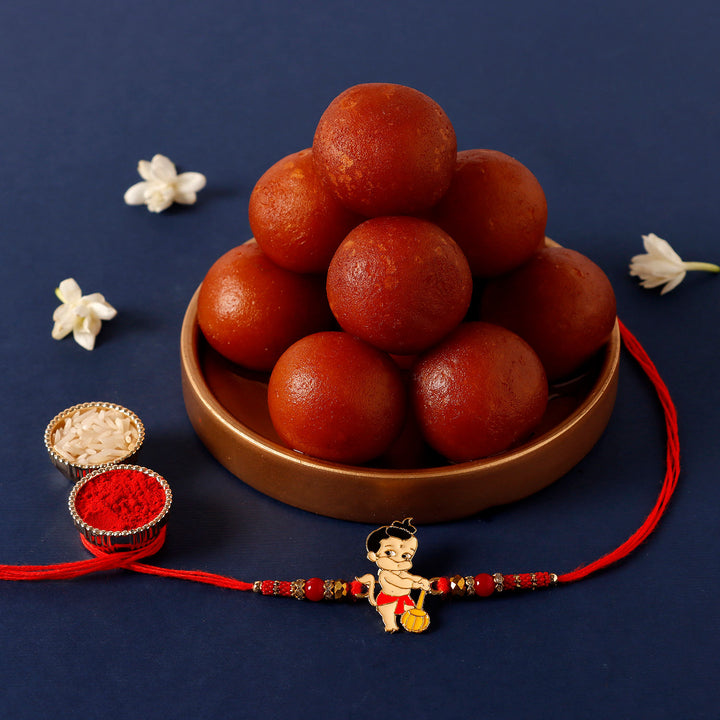 Sneh Holy Bal Hanuman Kids Rakhi with 1 Kg Gulab Jamun & Complimentary Roli Chawal