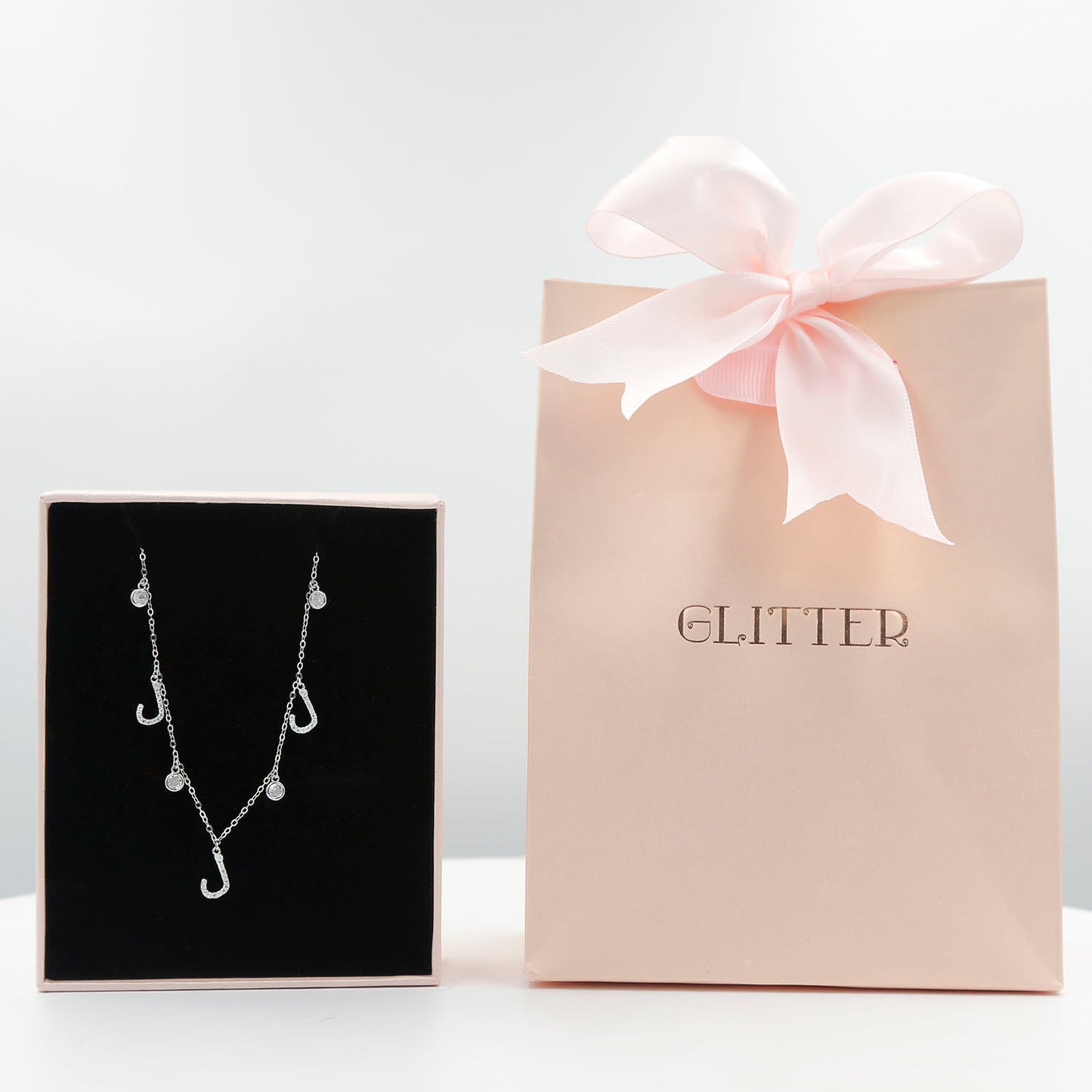 Elegant Sterling Silver Necklace with Arabic Letter 'L' Design