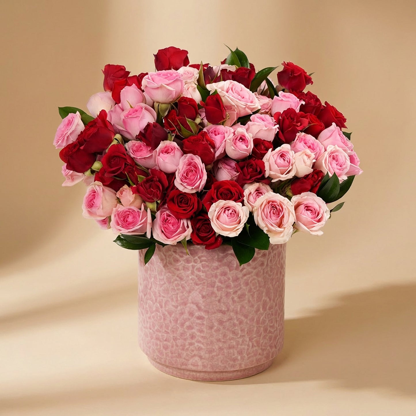 Sweet Embrace Red and Pink Spray Roses in Elegant Pink Vase