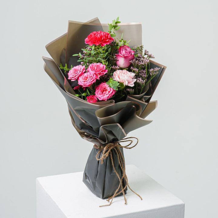 Token of Affection: Elegant Graduation Day Bouquet