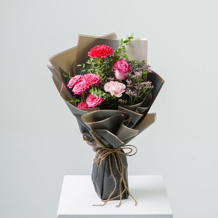 Token of Affection: Elegant Graduation Day Bouquet