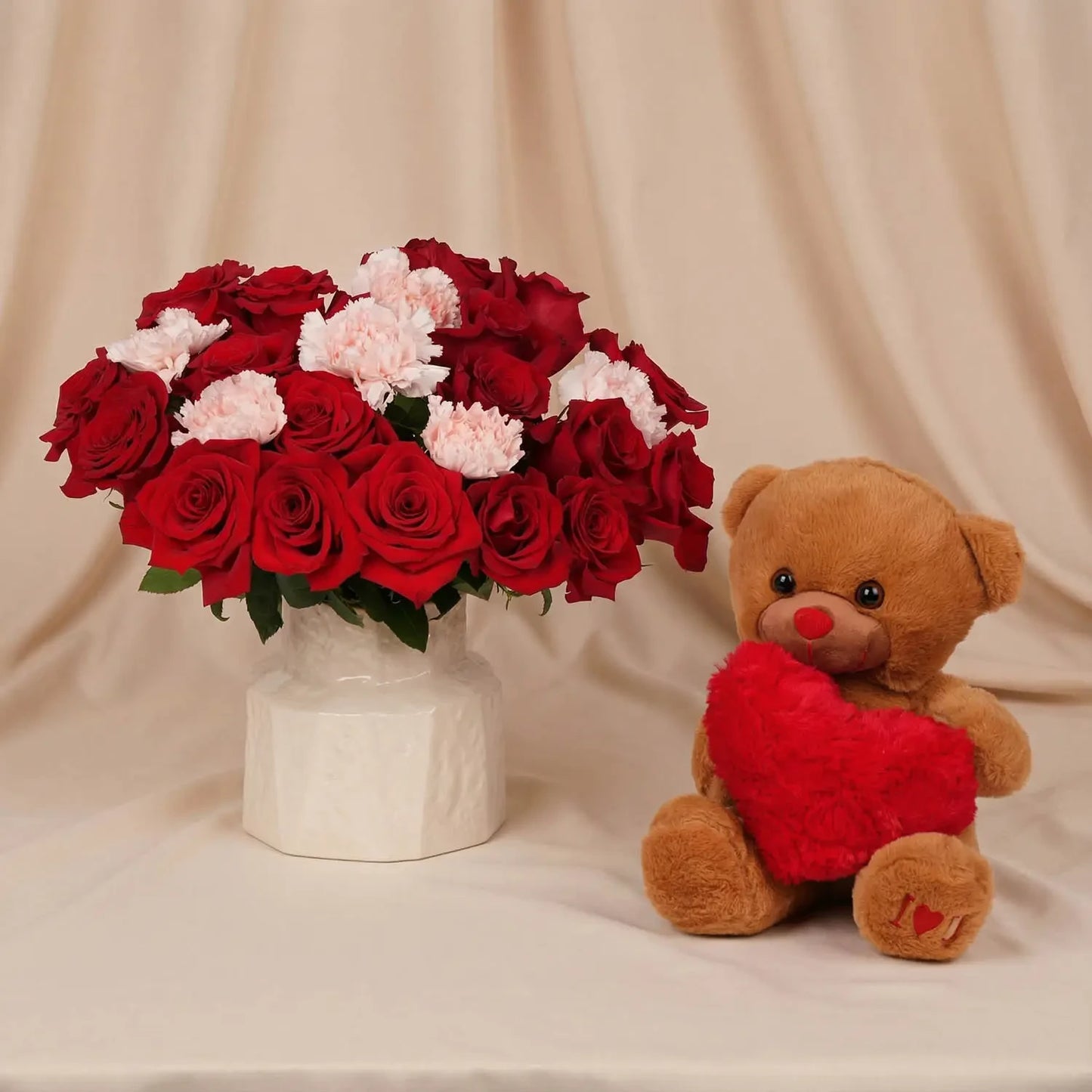 Elegant Romance: Red Roses & Pink Carnations in Designer Vase