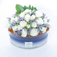 WoodWick Ellipse Candle - Evening Luxe with Elegant Floral Arrangement