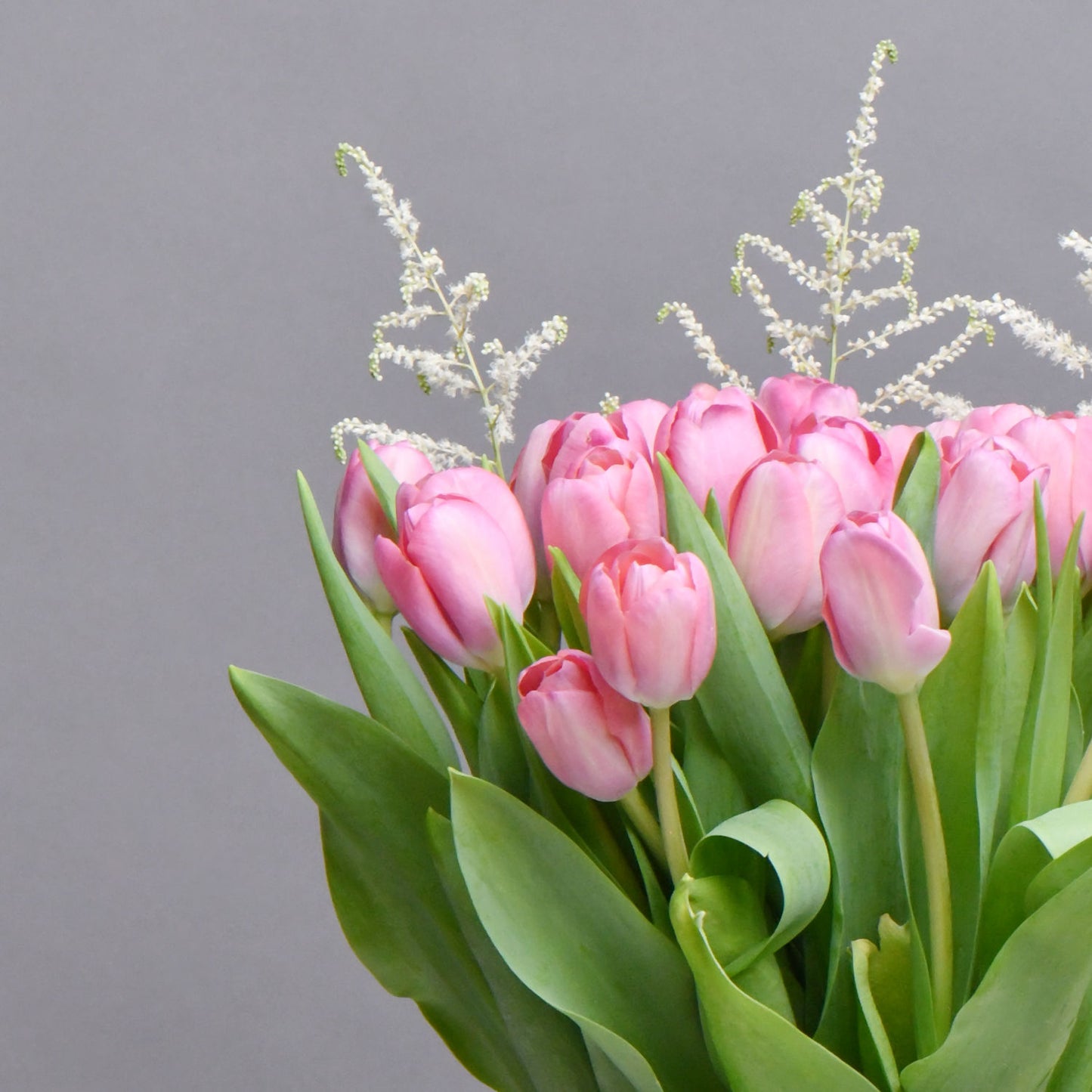 Exquisite Pink Tulips in Fish Bowl Vase