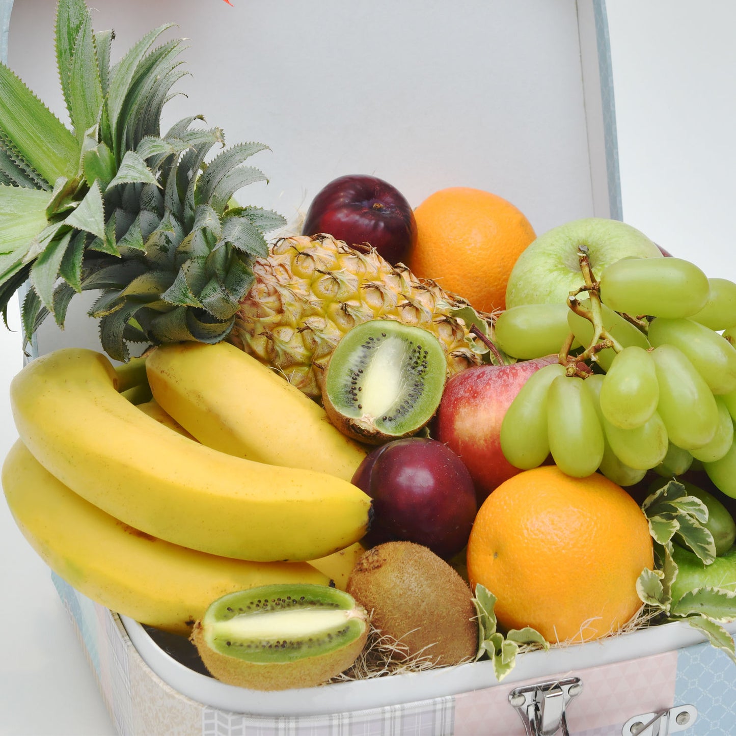 Deluxe Exotic Fruit Hamper in Elegant Floral Suitcase
