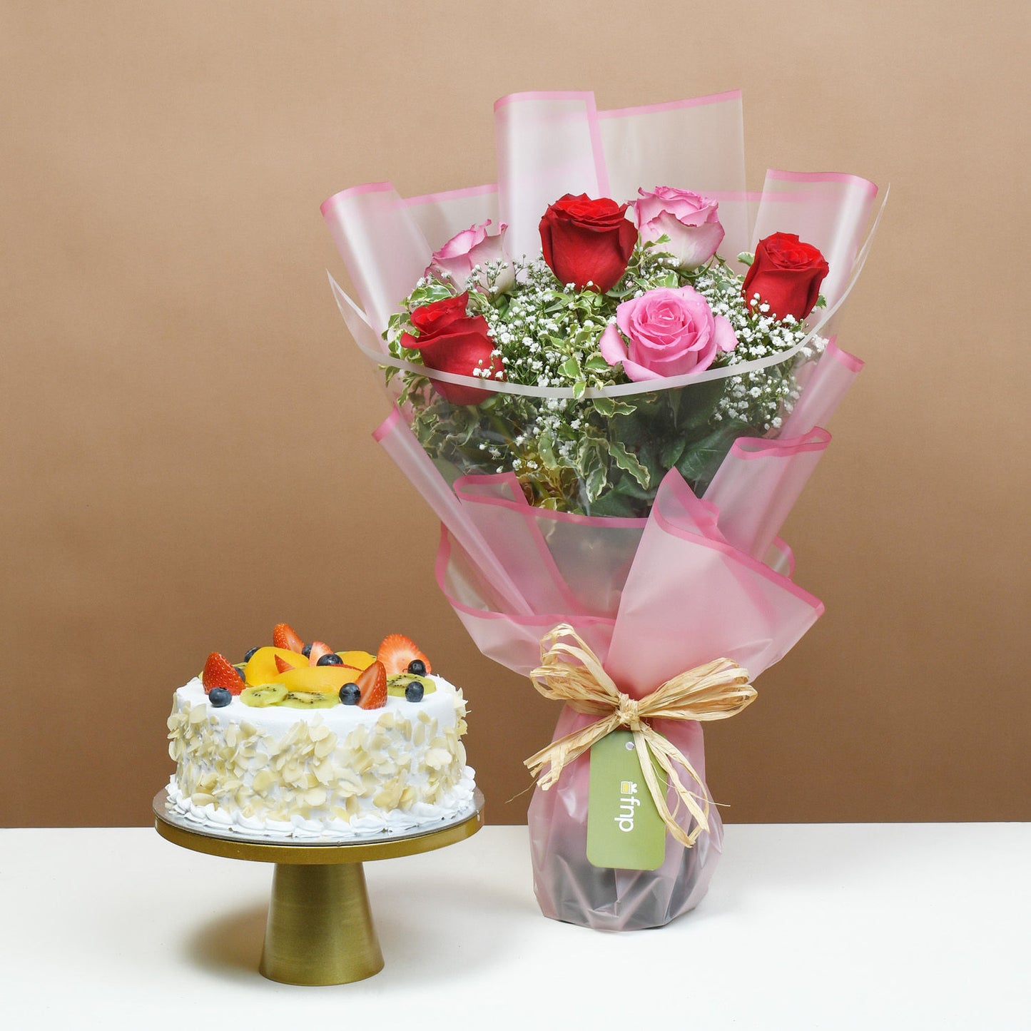 Elegant Bouquet of Blushing Roses with Delectable Fruit Cake