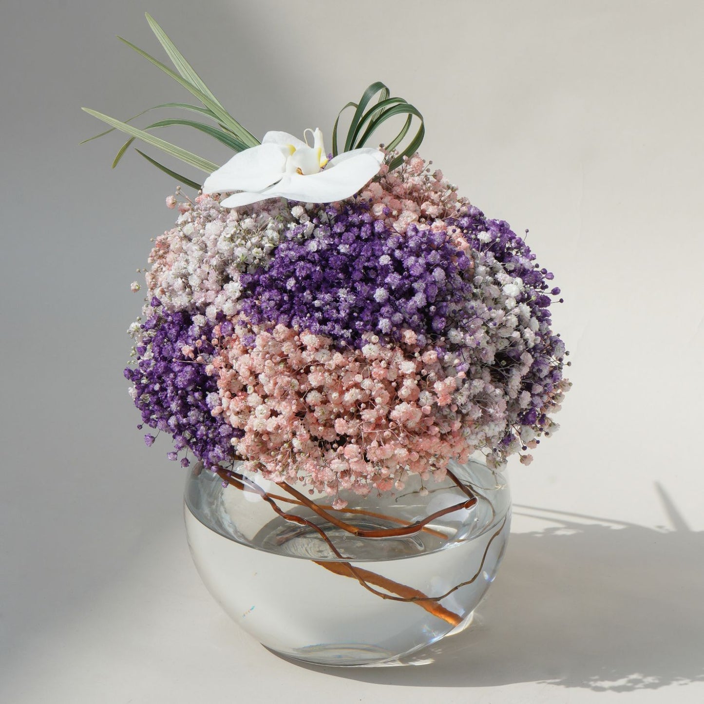 Enchanting Floral Symphony: Multicolored Baby Breath in Glass Bowl