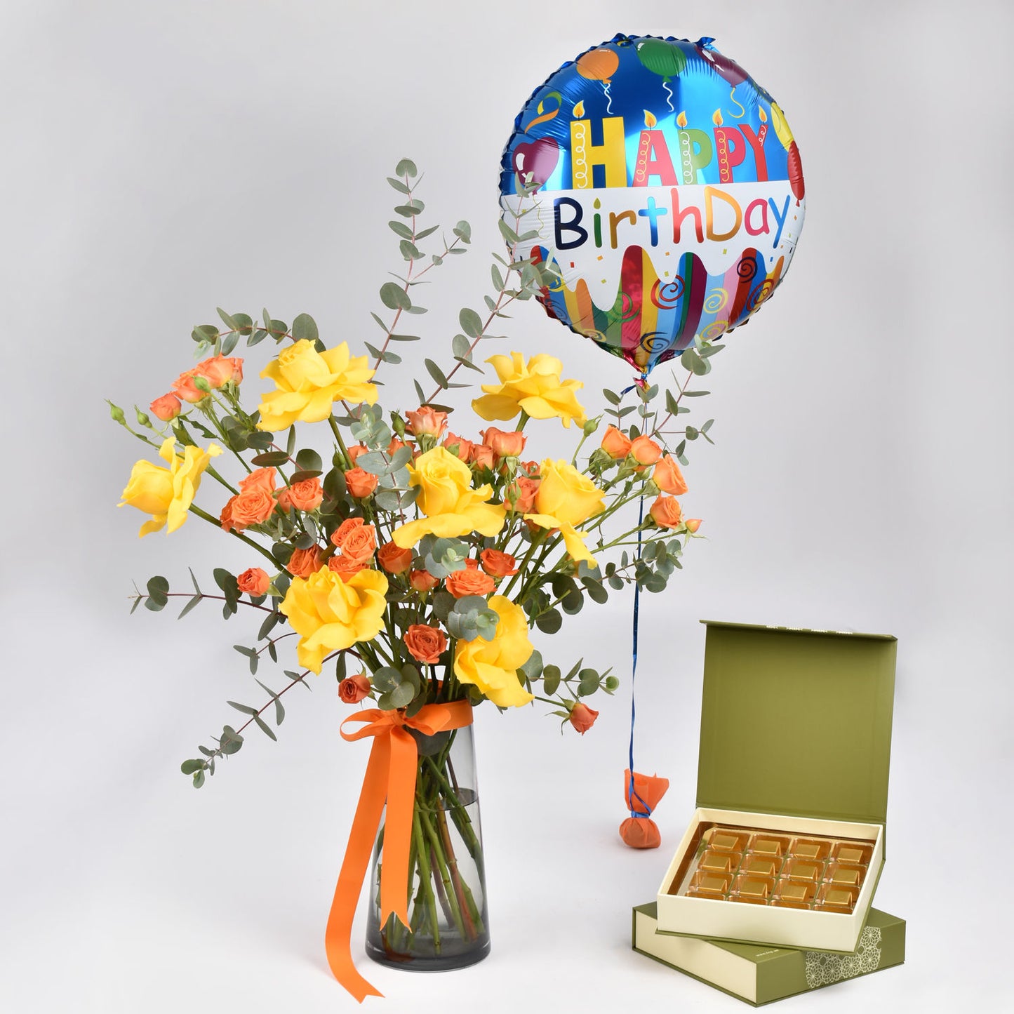 Elegant Birthday Celebration: Vibrant Roses Combo with Premium Chocolates
