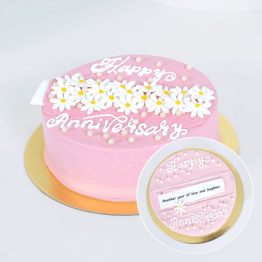 Elegant Pink Chocolate Anniversary Cake with Floral Design