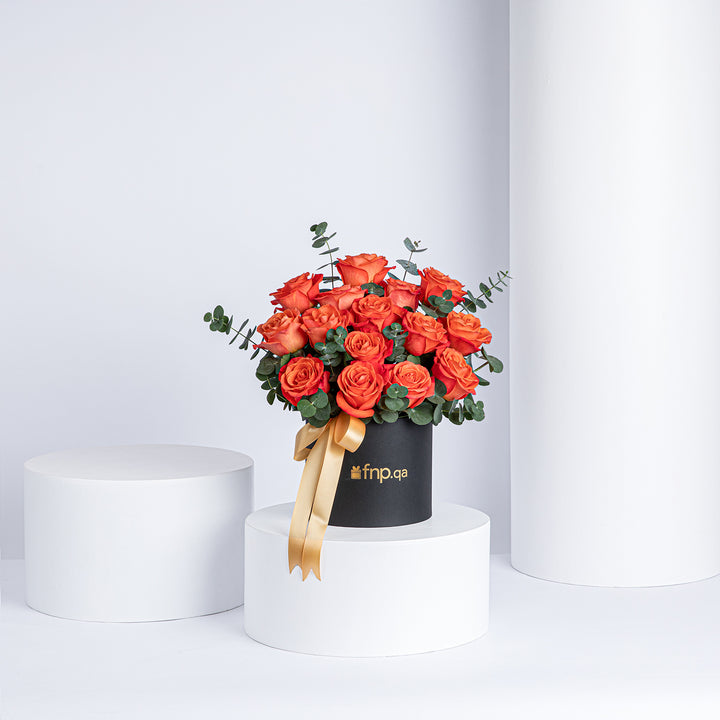 Exquisite 15 Orange Roses Box Arrangement with Eucalyptus and Ruscus
