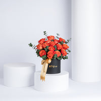 Exquisite 15 Orange Roses Box Arrangement with Eucalyptus and Ruscus
