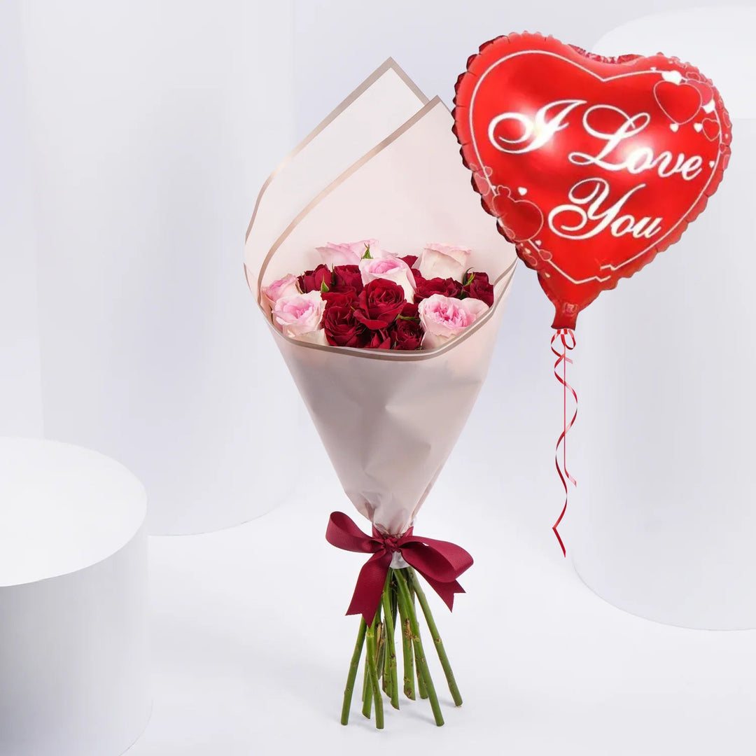 لحظات متفتحة – باقة أنيقة من الورود الحمراء والوردية