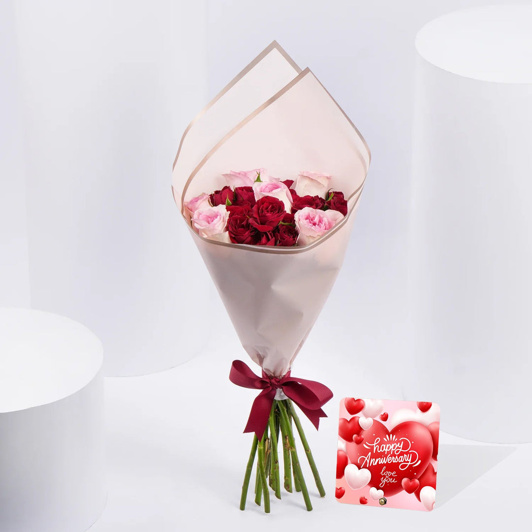 لحظات متفتحة – باقة أنيقة من الورود الحمراء والوردية