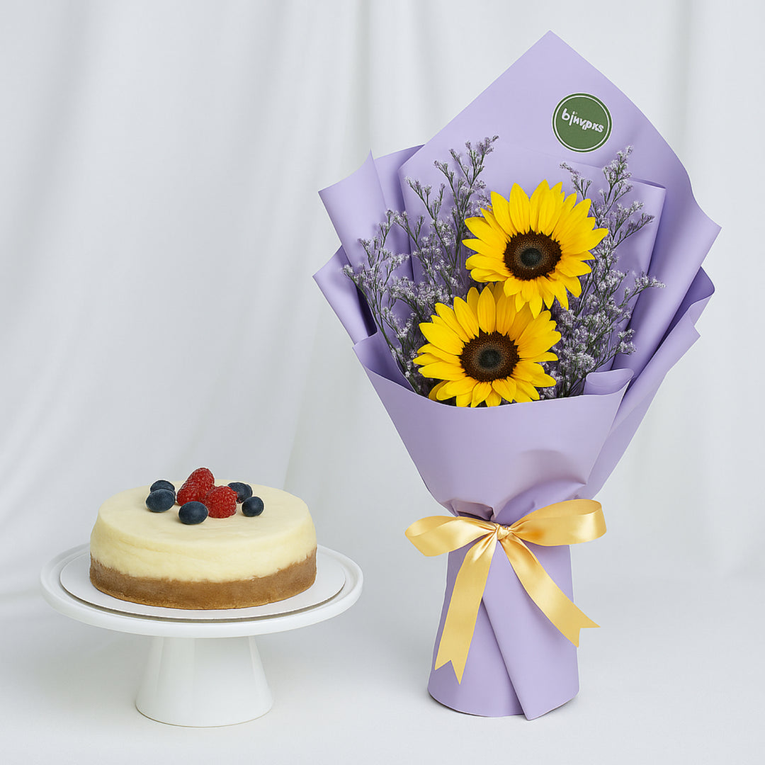 كيكة فانيليا ديلوكس مع باقة زهور عباد الشمس الأنيقة