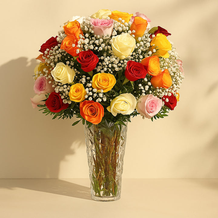 Elegant Bouquet of 50 Assorted Roses in a Stylish Glass Vase