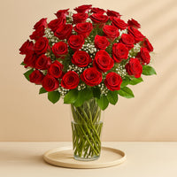 Luxurious Bouquet of 50 Scarlet Red Roses with Elegant Fillers in a Glass Vase