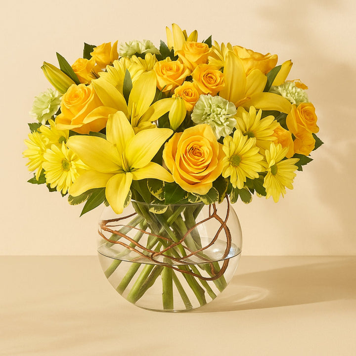 Joyful Sunshine Floral Arrangement in Elegant Fish Bowl