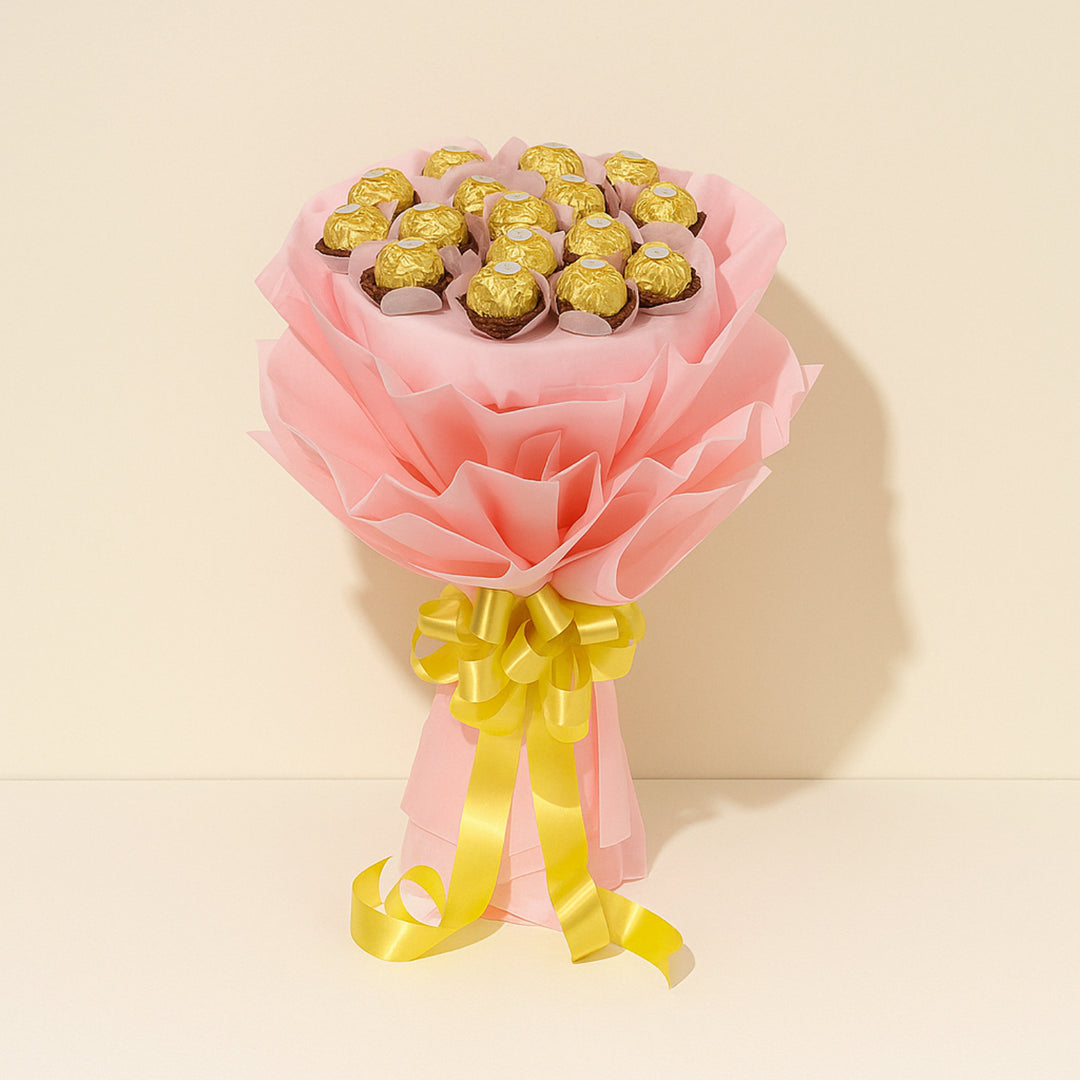 باقة شوكولاته فيريرو روشيه الفاخرة مع تغليف وردي وشريط ذهبي