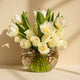 Elegant White Roses and Tulips in a Decorative Glass Vase