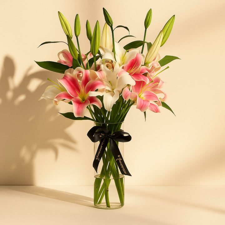 Elegant White and Pink Lily Arrangement in Glass Vase