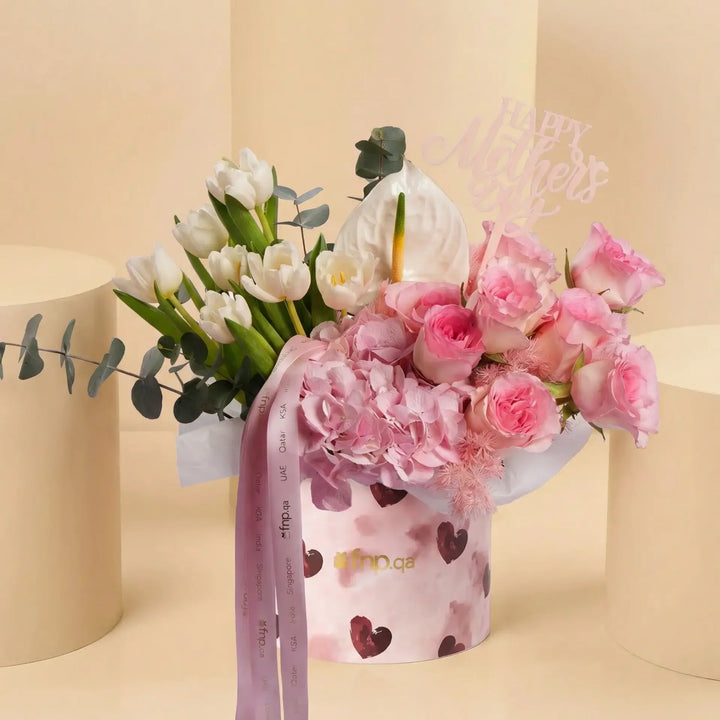 A Mother's Sweet Embrace: Elegant Floral Arrangement