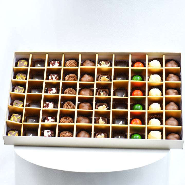 Luxurious Chocolate Box with 60 Assorted Belgian Pieces and Elegant Red Flower Arrangement