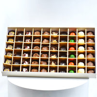 Luxurious Chocolate Box with 60 Assorted Belgian Pieces and Elegant Red Flower Arrangement