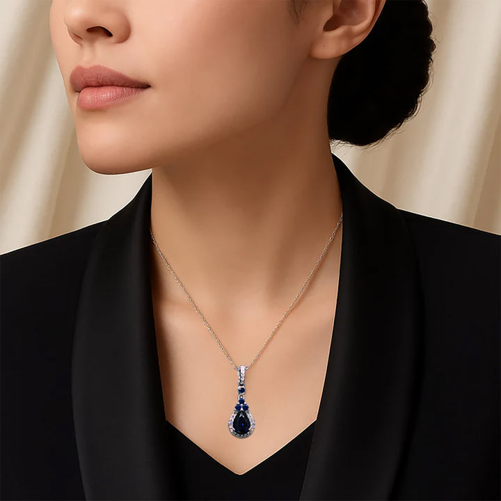 The Sapphire Glow Necklace with Elegant Yellow Rose Box