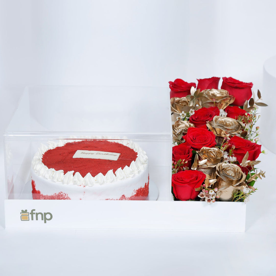 Birthday Bliss: Luxurious Red Velvet Cake with Elegant Floral Arrangement